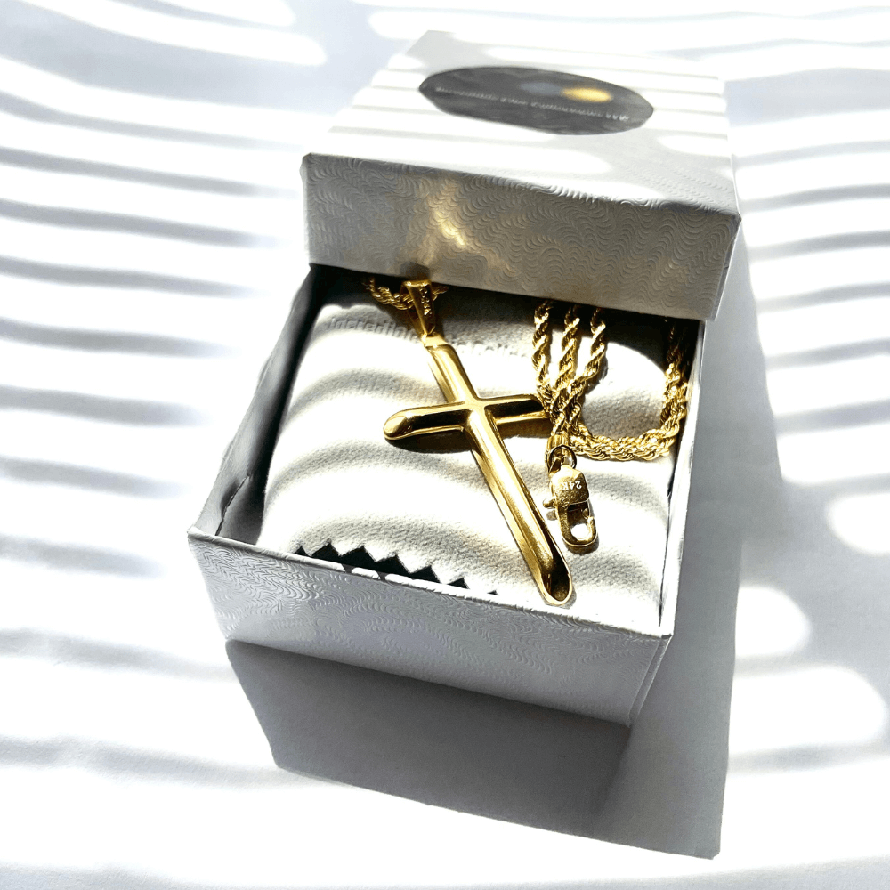 24K gold-filled rope chain with cross pendant in elegant gift box, showcasing premium craftsmanship and luxurious design.