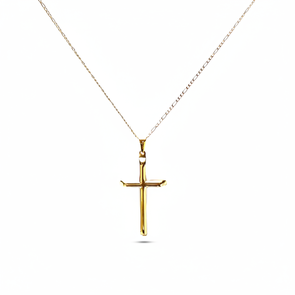 Gold cross pendant on a thin figaro chain against a white background