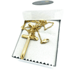 Load image into Gallery viewer, 24k gold overlay cross pendant necklace with Figaro chain in a gift box for men, women, and teens.
